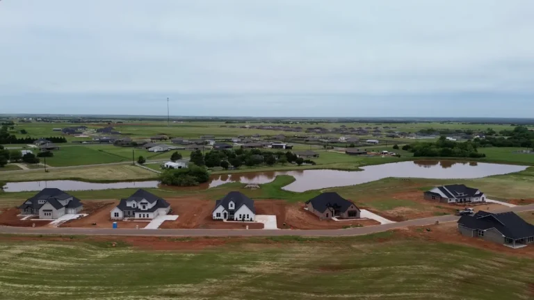new home development community in Cashion near a lake